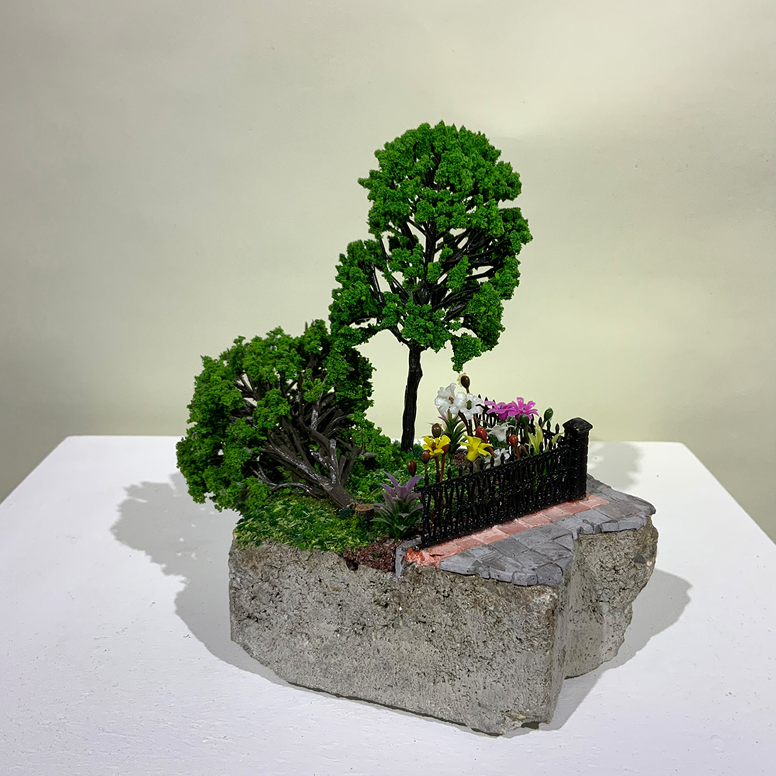 A miniature sculpture a fallen tree from On the Rubble of our Ancestors