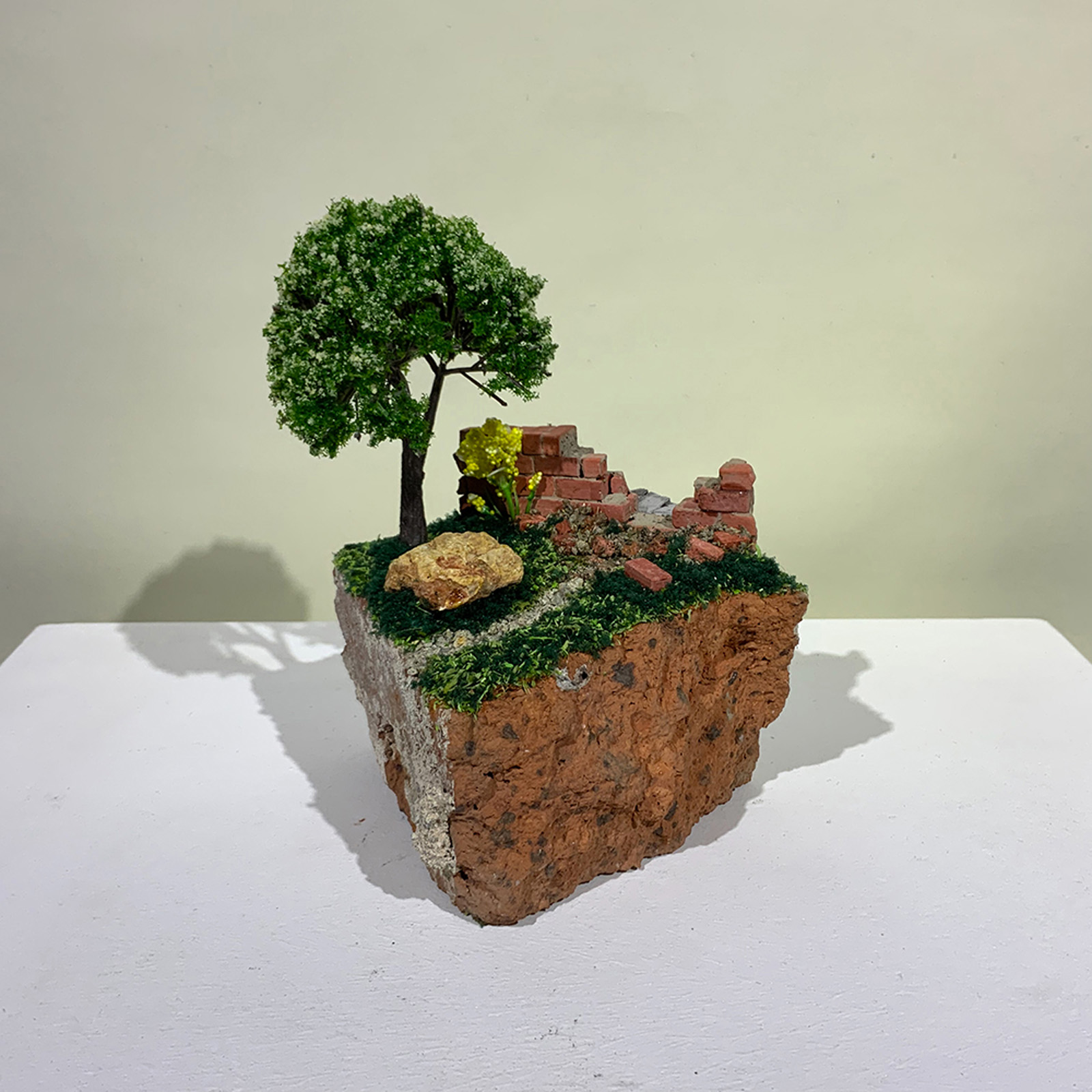 A miniature sculpture of path on a path from On the Rubble of our Ancestors