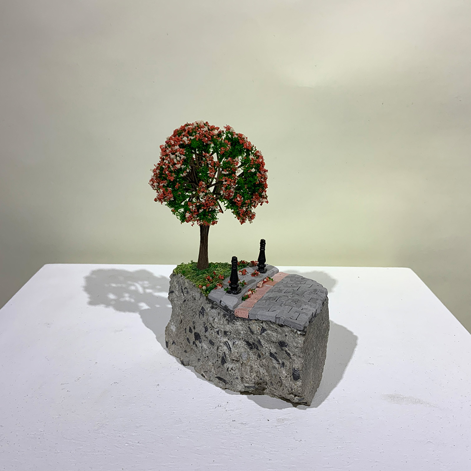 A miniature sculpture of a tree from On the Rubble of our Ancestors